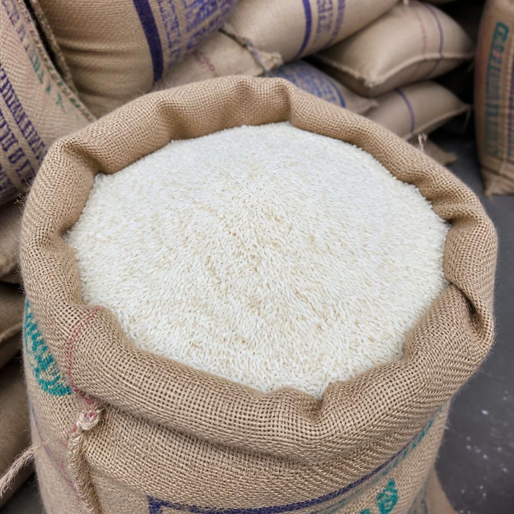 Polished Indian export-quality rice in a jute sack